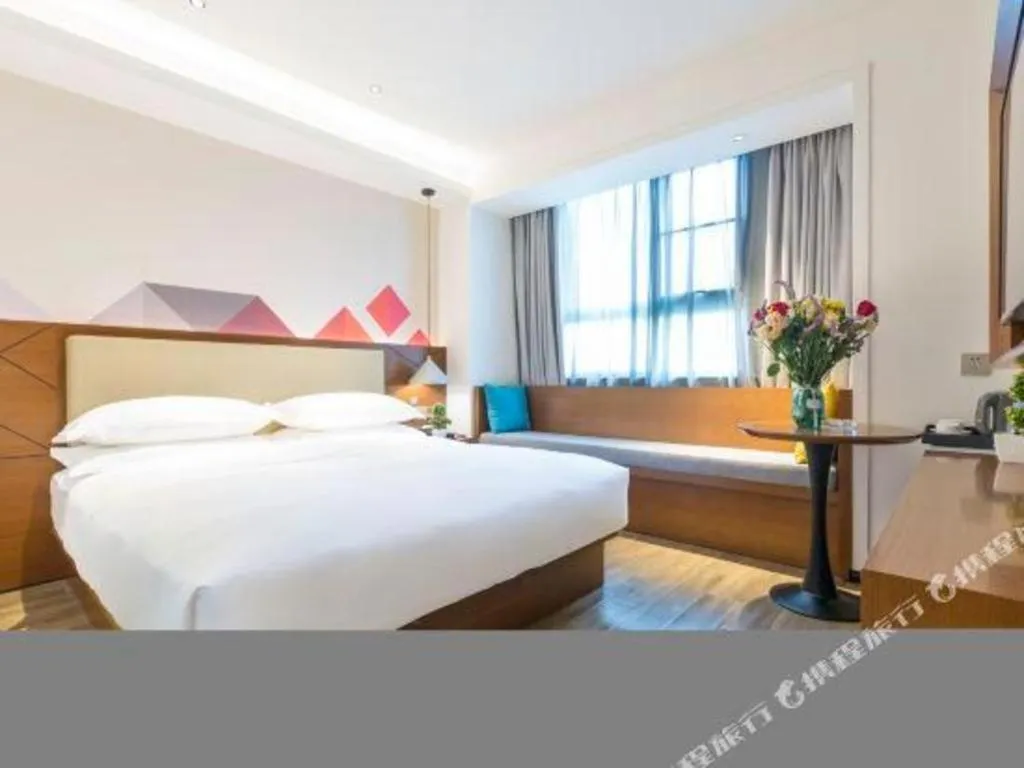 Bed in Borrman Hotel Guangzhou Southern Hospital Meihuayuan Metro Station