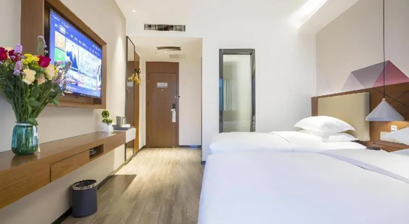 Bed in Borrman Hotel Guangzhou Southern Hospital Meihuayuan Metro Station