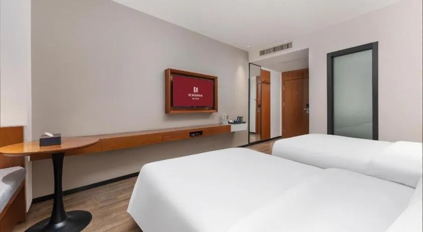 Bed in Borrman Hotel Guangzhou Southern Hospital Meihuayuan Metro Station