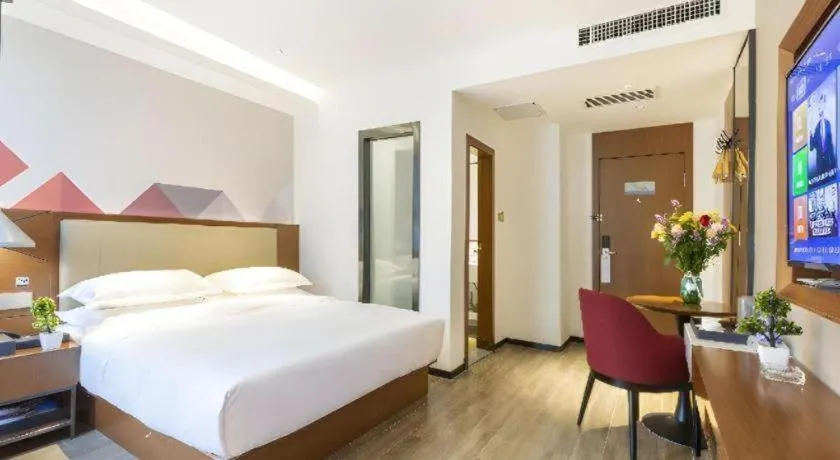 Bed in Borrman Hotel Guangzhou Southern Hospital Meihuayuan Metro Station