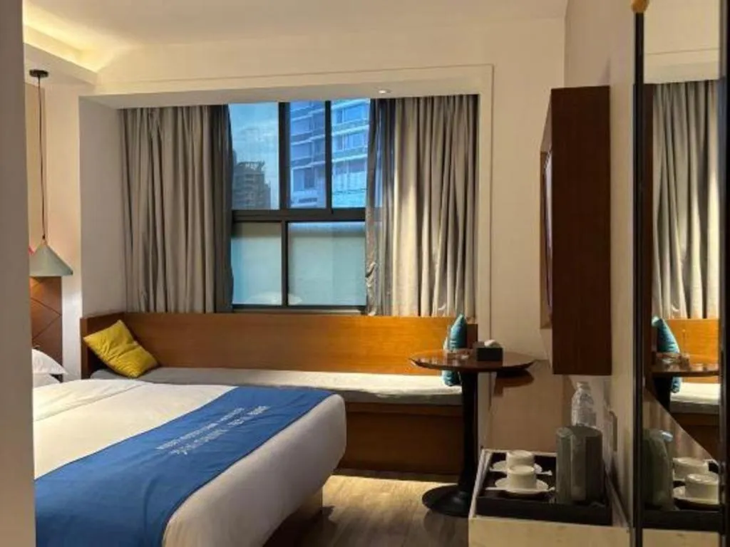 Bed in Borrman Hotel Guangzhou Southern Hospital Meihuayuan Metro Station