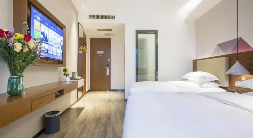 Bed in Borrman Hotel Guangzhou Southern Hospital Meihuayuan Metro Station