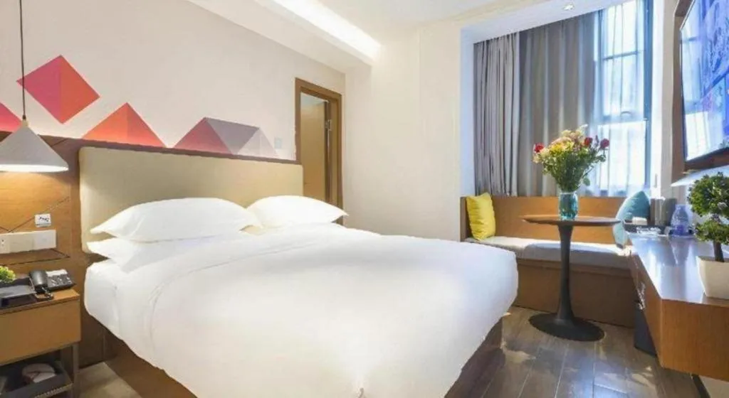 Bed in Borrman Hotel Guangzhou Southern Hospital Meihuayuan Metro Station