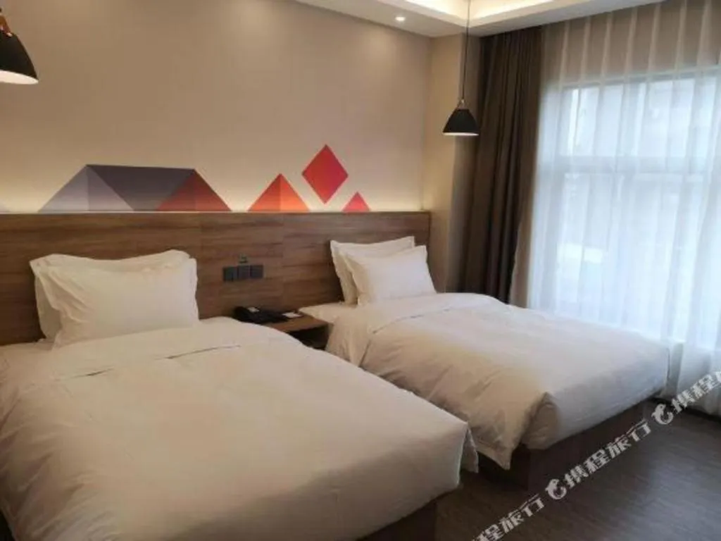 Bed in Borrman Hotel Guangzhou Southern Hospital Meihuayuan Metro Station