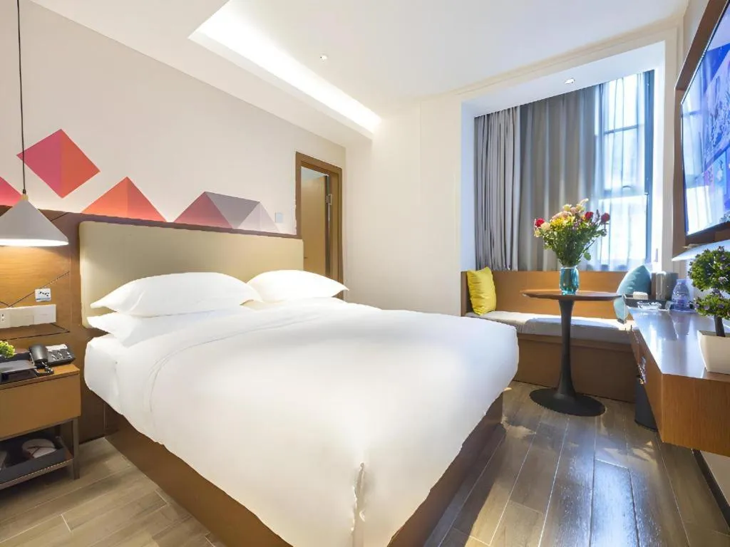 Bed in Borrman Hotel Guangzhou Southern Hospital Meihuayuan Metro Station