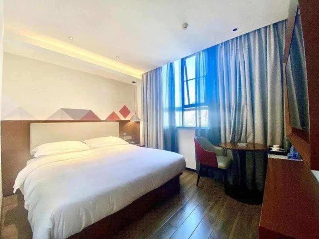 Bed in Borrman Hotel Guangzhou Southern Hospital Meihuayuan Metro Station