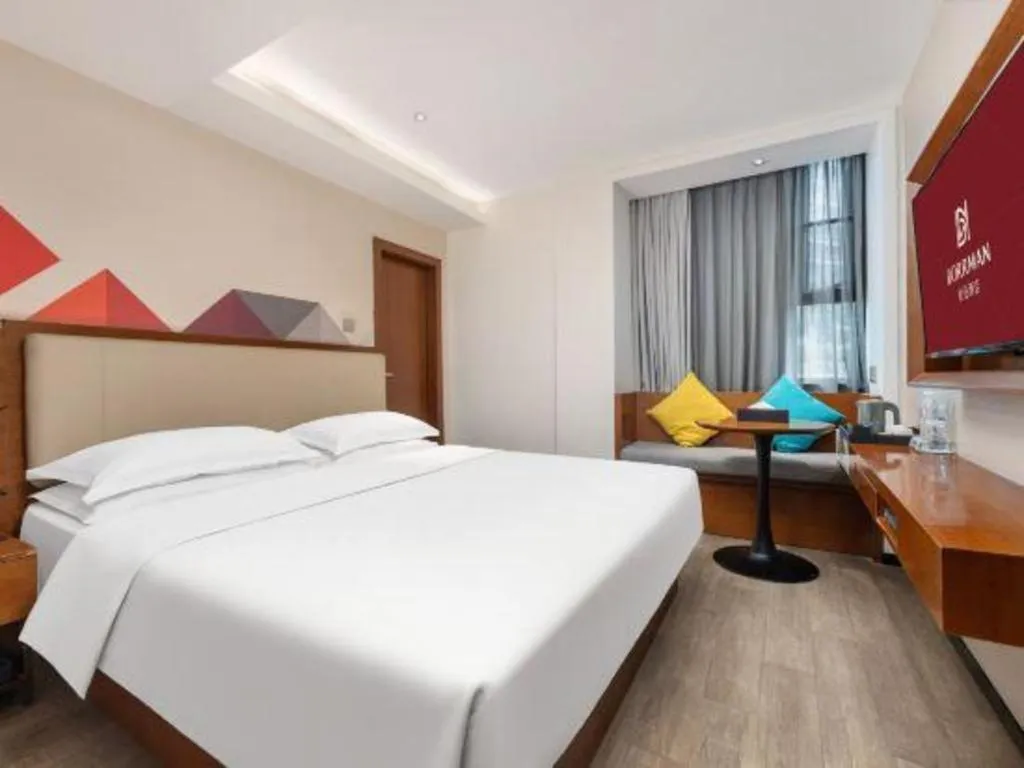 Bed in Borrman Hotel Guangzhou Southern Hospital Meihuayuan Metro Station