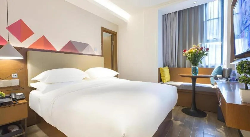 Bed in Borrman Hotel Guangzhou Southern Hospital Meihuayuan Metro Station