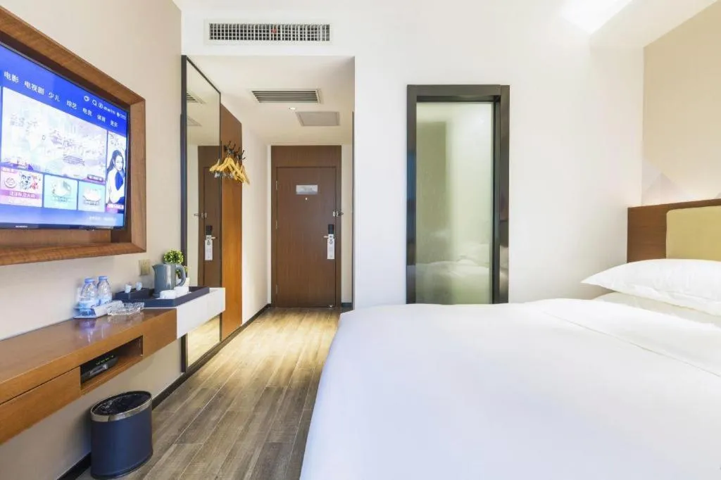 Bed in Borrman Hotel Guangzhou Southern Hospital Meihuayuan Metro Station