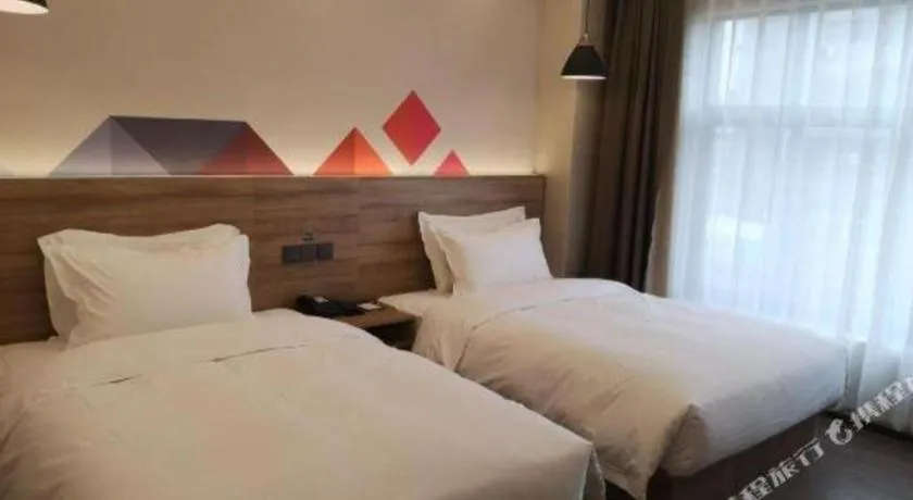 Bed in Borrman Hotel Guangzhou Southern Hospital Meihuayuan Metro Station