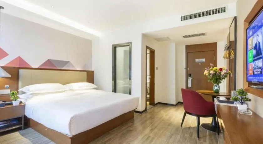 Bed in Borrman Hotel Guangzhou Southern Hospital Meihuayuan Metro Station