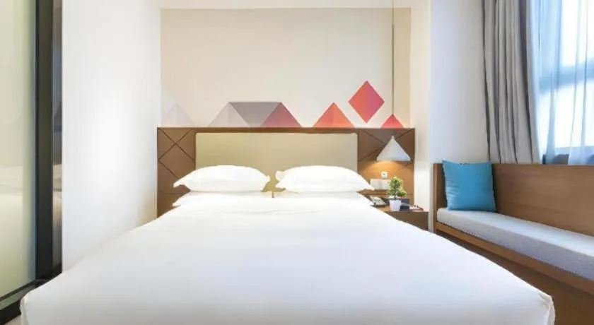 Bed in Borrman Hotel Guangzhou Southern Hospital Meihuayuan Metro Station