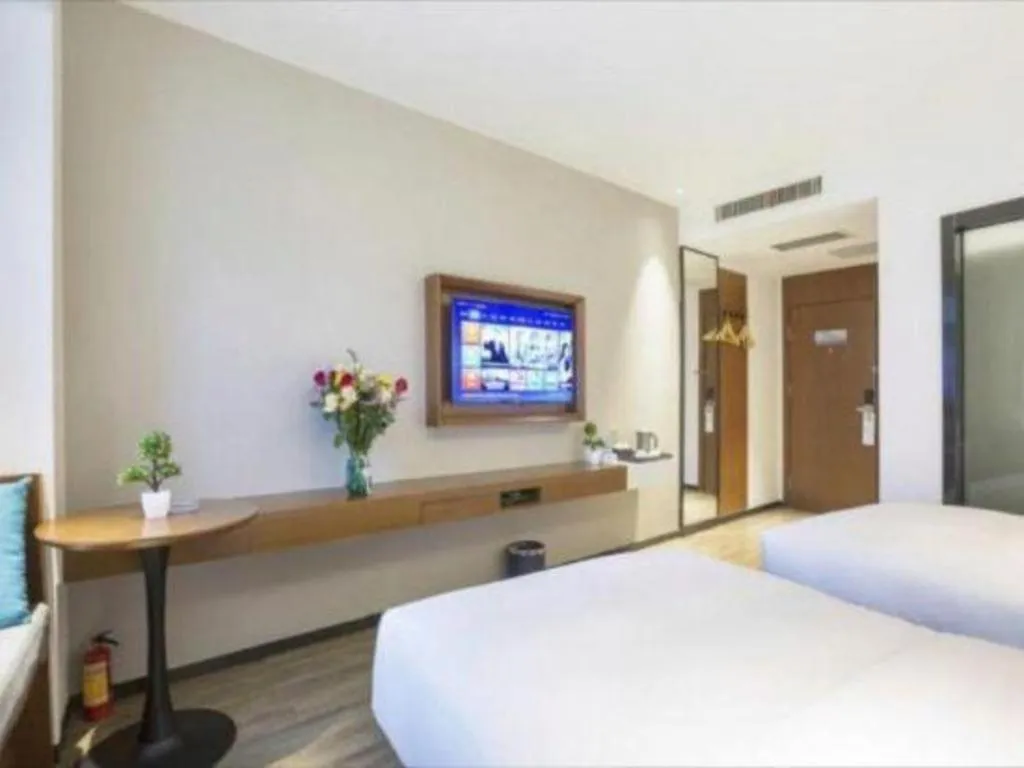 Bed in Borrman Hotel Guangzhou Southern Hospital Meihuayuan Metro Station