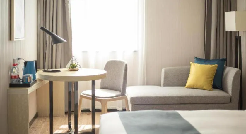 Bed in Echarm Hotel Shenzhen World Exhibition and Convention Center