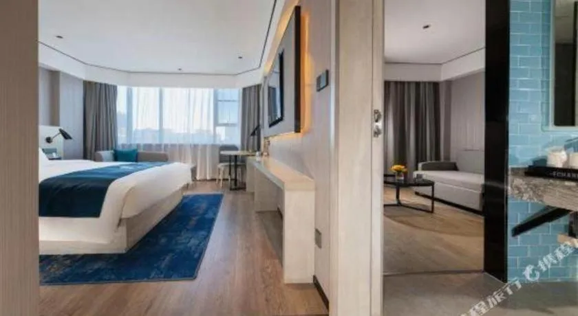 Bed in Echarm Hotel Shenzhen World Exhibition and Convention Center