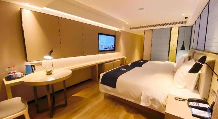 Bed in Echarm Hotel Shenzhen World Exhibition and Convention Center