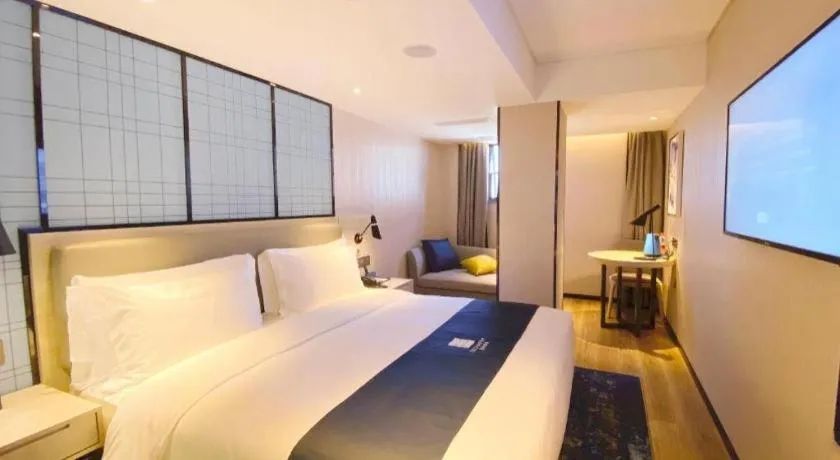 Bed in Echarm Hotel Shenzhen World Exhibition and Convention Center