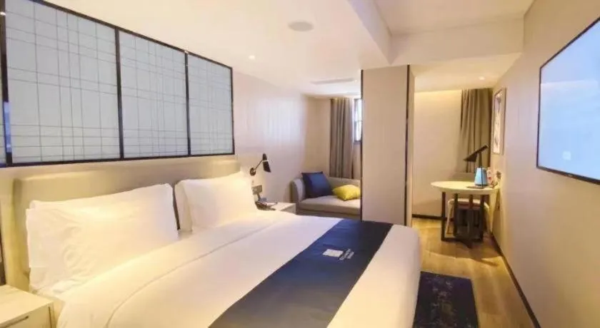 Bed in Echarm Hotel Shenzhen World Exhibition and Convention Center