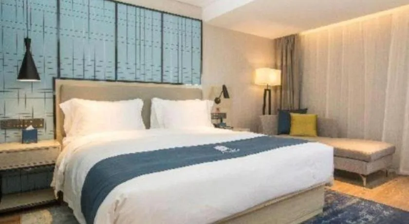 Bed in Echarm Hotel Shenzhen World Exhibition and Convention Center