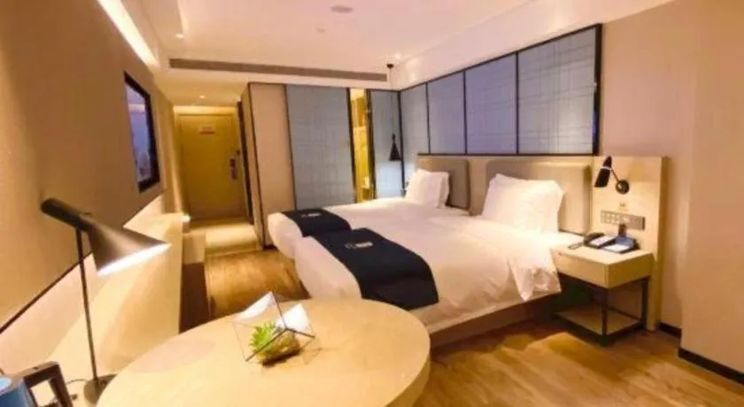 Bed in Echarm Hotel Shenzhen World Exhibition and Convention Center