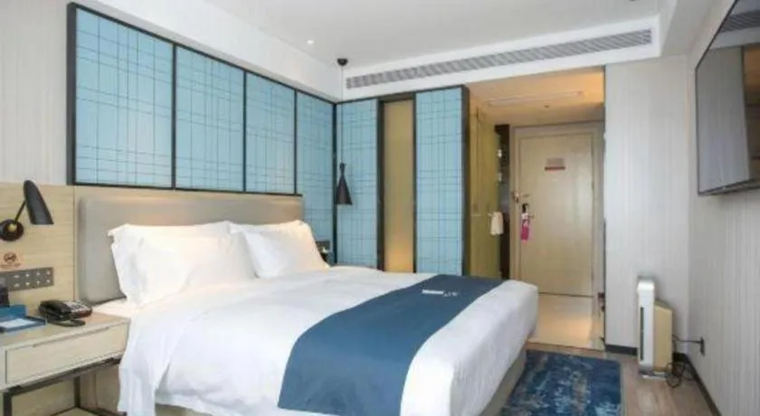 Bed in Echarm Hotel Shenzhen World Exhibition and Convention Center