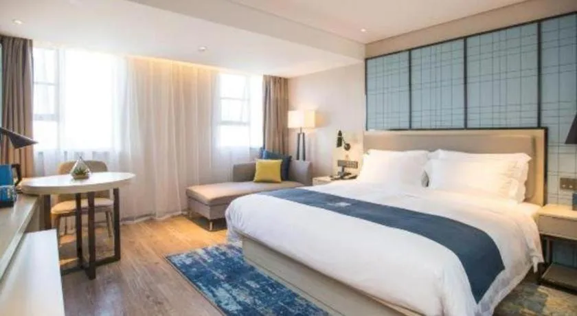 Bed in Echarm Hotel Shenzhen World Exhibition and Convention Center