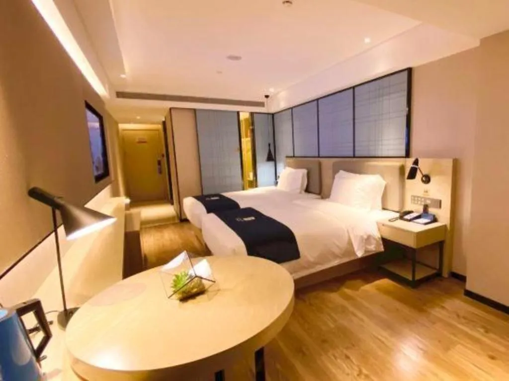 Bed in Echarm Hotel Shenzhen World Exhibition and Convention Center