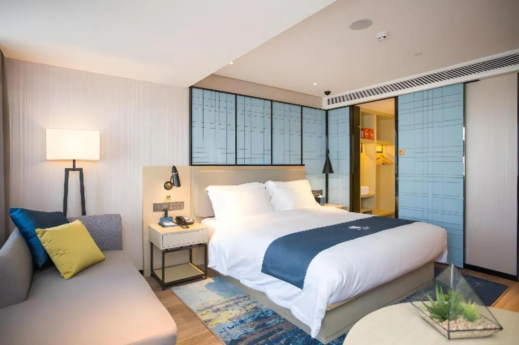 Bed in Echarm Hotel Shenzhen World Exhibition and Convention Center