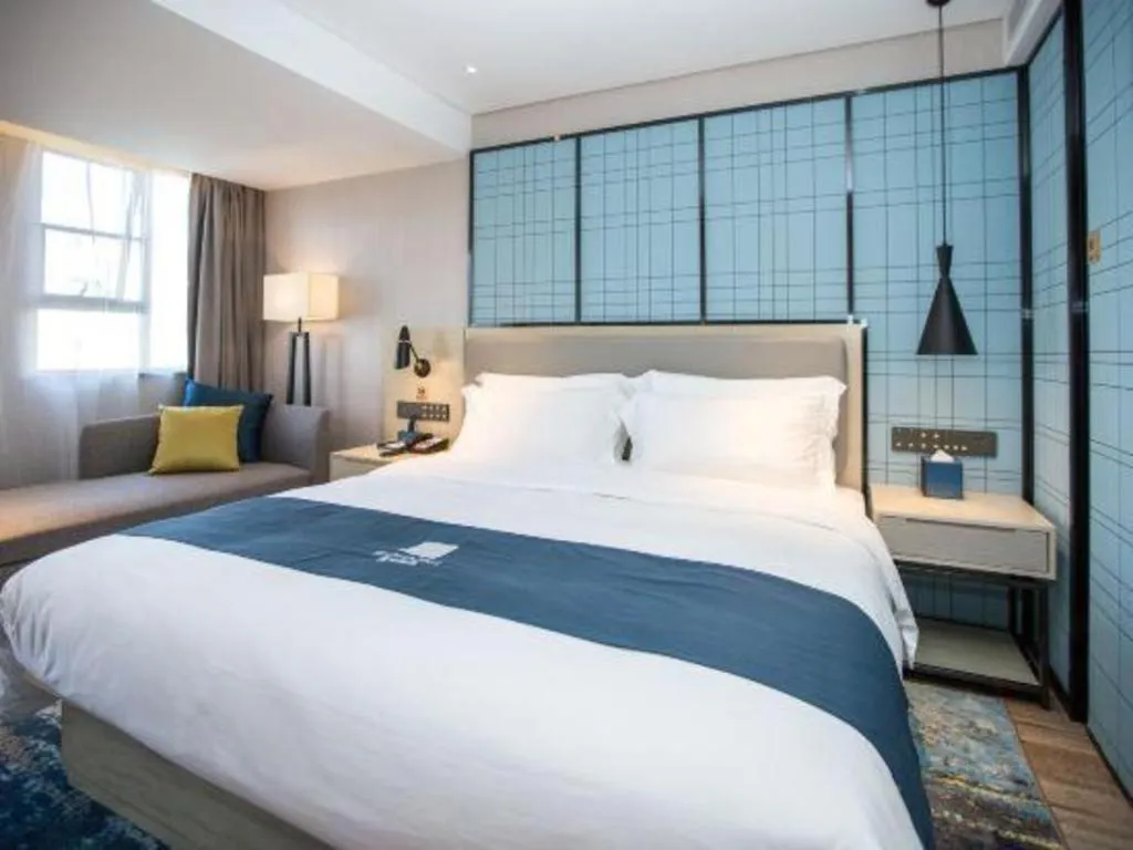 Bed in Echarm Hotel Shenzhen World Exhibition and Convention Center