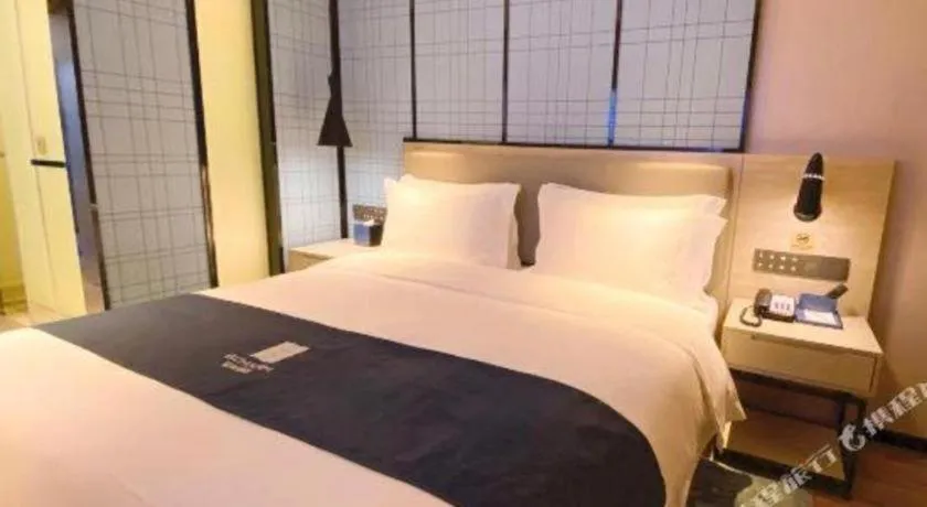 Bed in Echarm Hotel Shenzhen World Exhibition and Convention Center