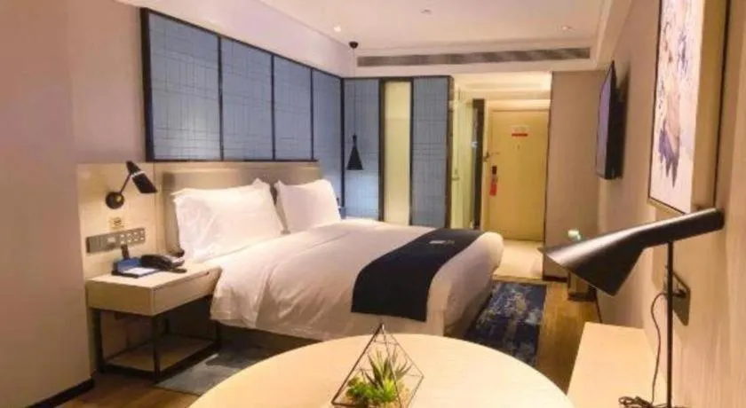 Bed in Echarm Hotel Shenzhen World Exhibition and Convention Center