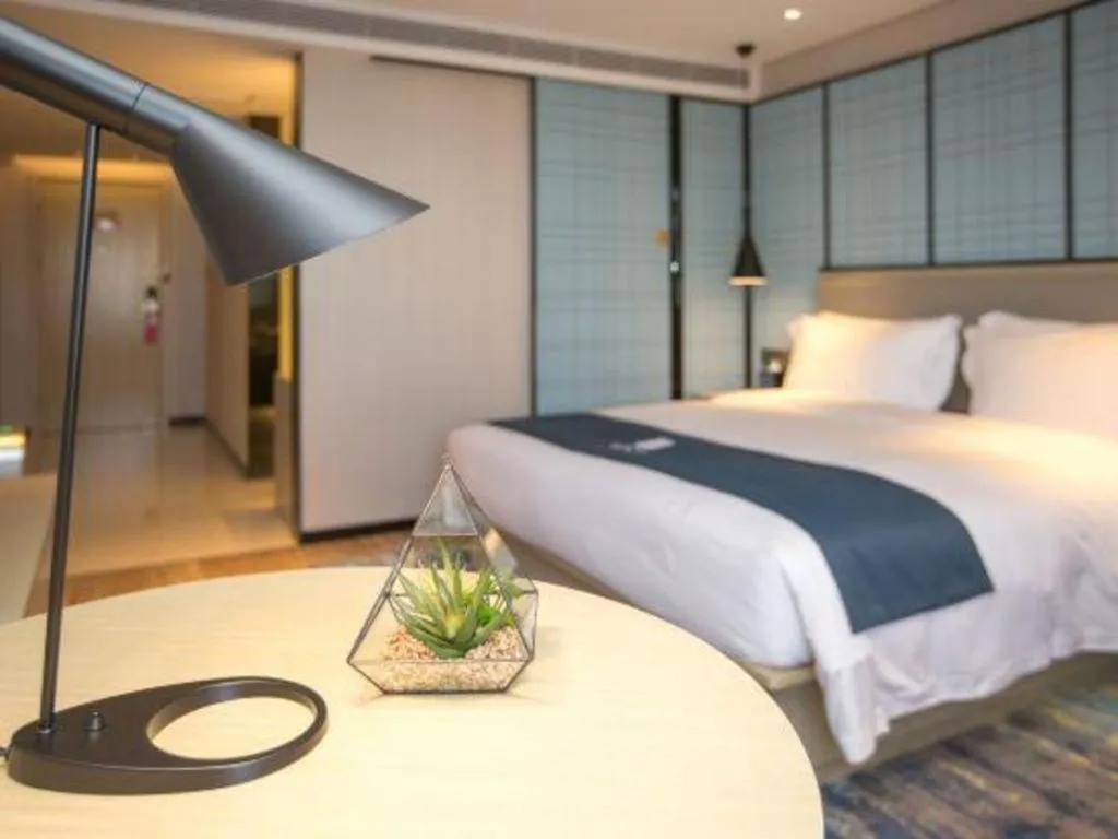 Bed in Echarm Hotel Shenzhen World Exhibition and Convention Center