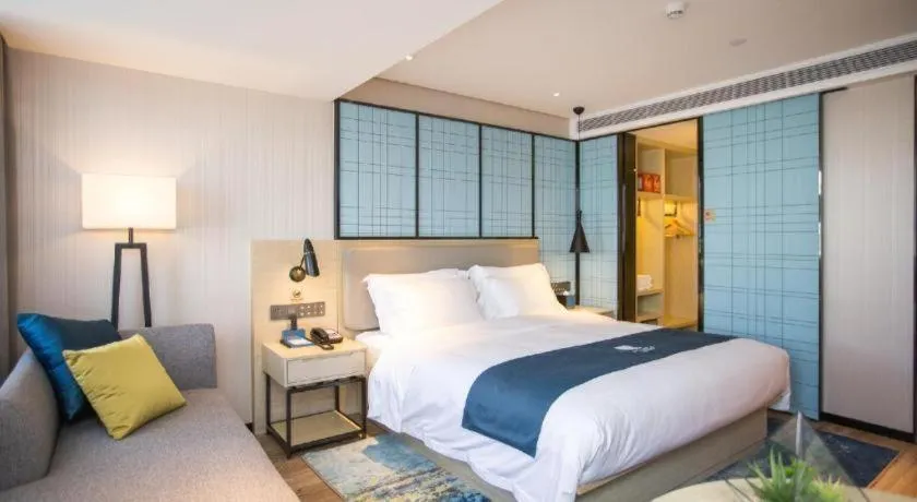 Bed in Echarm Hotel Shenzhen World Exhibition and Convention Center