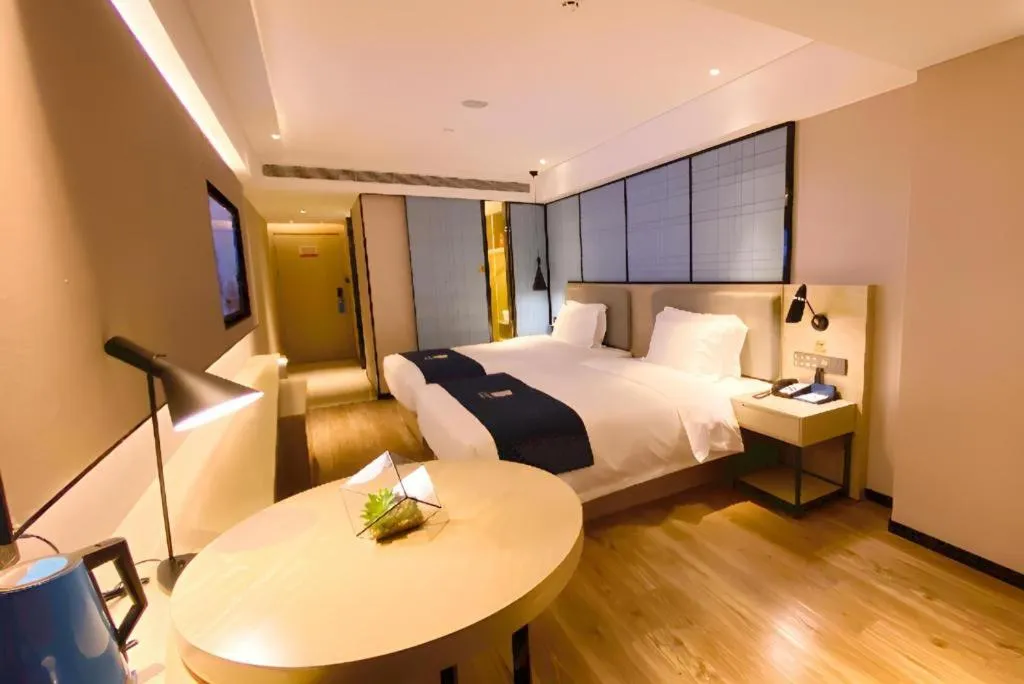 Bed in Echarm Hotel Shenzhen World Exhibition and Convention Center