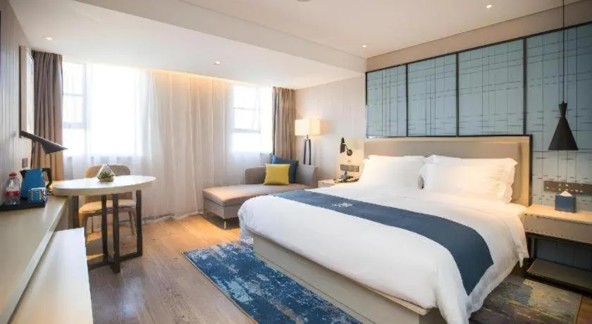 Bed in Echarm Hotel Shenzhen World Exhibition and Convention Center