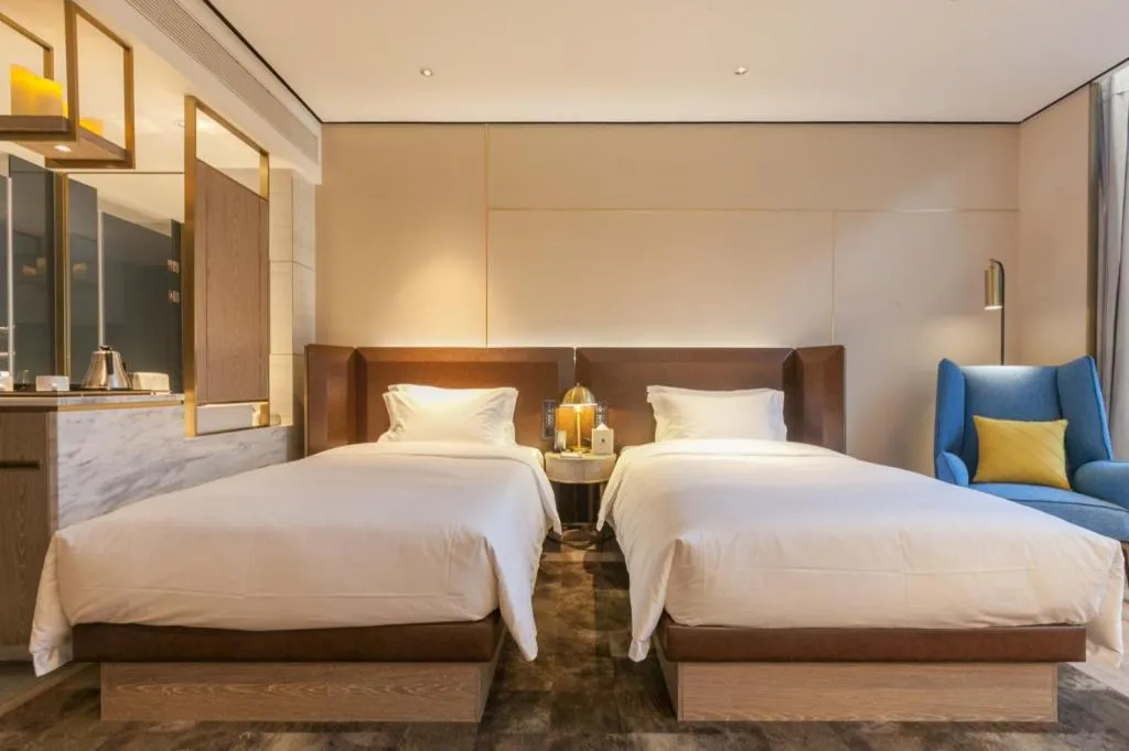 Bed in Echarm Plus Hotel Wuhan Wenhua Boulevard Dahualing Subway Statiom