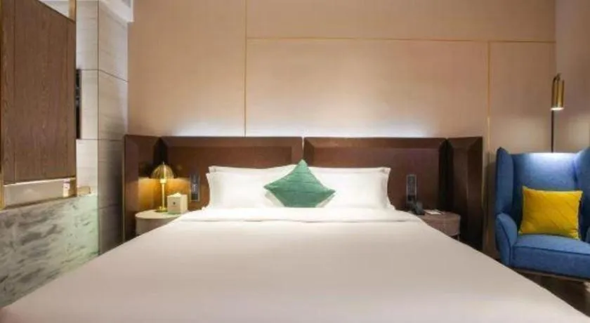 Bed in Echarm Plus Hotel Wuhan Wenhua Boulevard Dahualing Subway Statiom