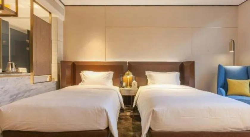 Bed in Echarm Plus Hotel Wuhan Wenhua Boulevard Dahualing Subway Statiom