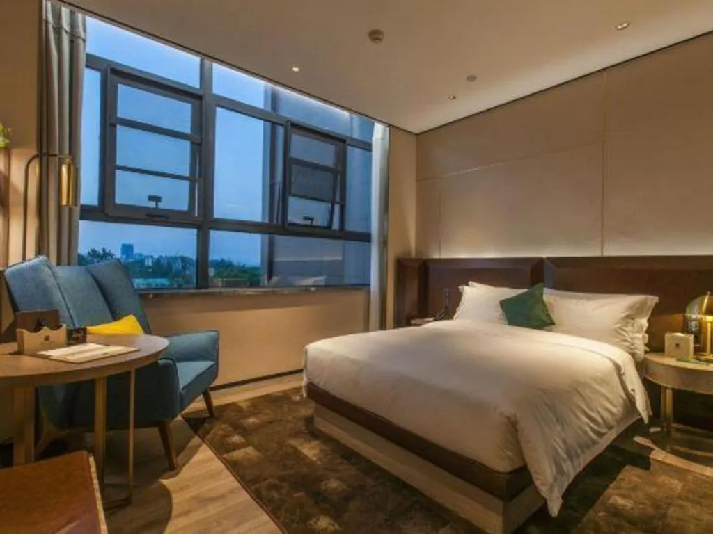 Bed in Echarm Plus Hotel Wuhan Wenhua Boulevard Dahualing Subway Statiom