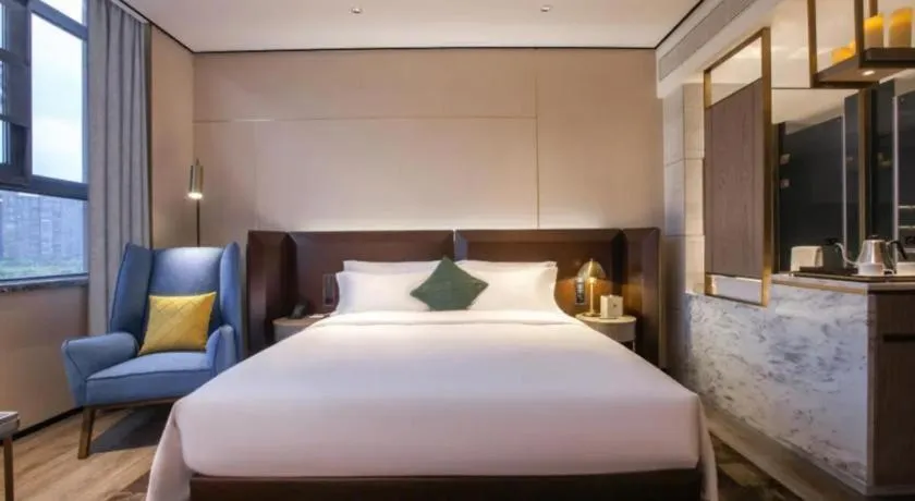 Bed in Echarm Plus Hotel Wuhan Wenhua Boulevard Dahualing Subway Statiom