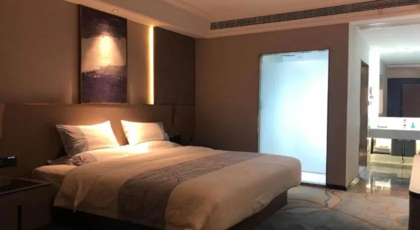 Bed in Echarm Plus Hotel Wuhan Wenhua Boulevard Dahualing Subway Statiom
