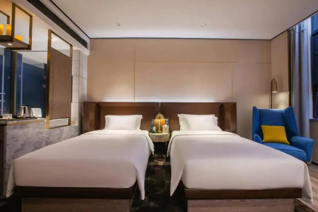Bed in Echarm Plus Hotel Wuhan Wenhua Boulevard Dahualing Subway Statiom