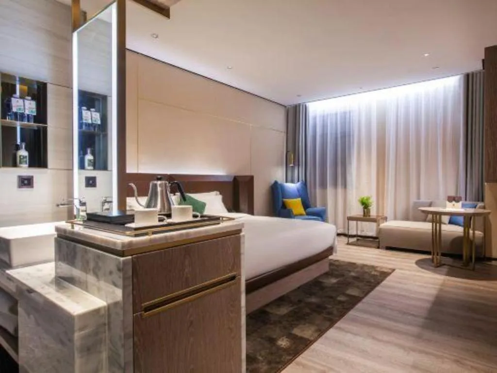 Bed in Echarm Plus Hotel Wuhan Wenhua Boulevard Dahualing Subway Statiom