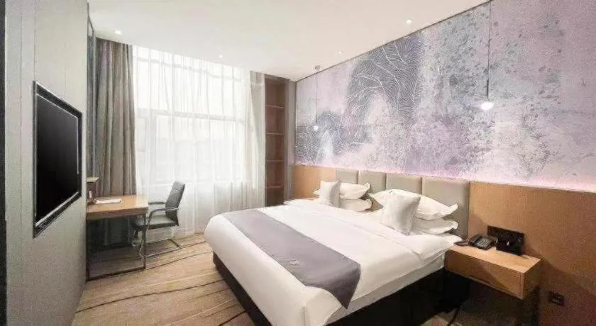Bed in GreenTree Eastern Hotel Tianjin Dongli Development Zone Xinli Metro Station