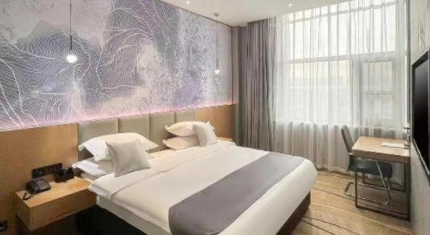 Bed in GreenTree Eastern Hotel Tianjin Dongli Development Zone Xinli Metro Station
