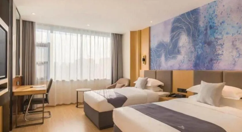 Bed in GreenTree Eastern Hotel Tianjin Dongli Development Zone Xinli Metro Station