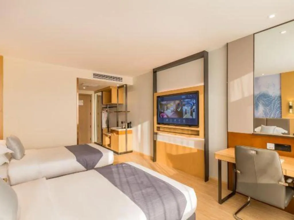 Bed in GreenTree Eastern Hotel Tianjin Dongli Development Zone Xinli Metro Station