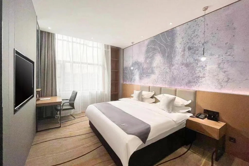 Bed in GreenTree Eastern Hotel Tianjin Dongli Development Zone Xinli Metro Station