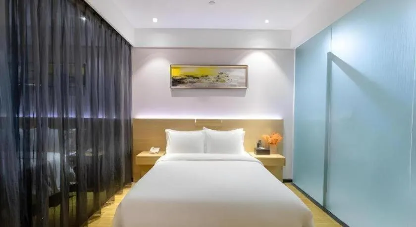 Bed in GreenTree Alliance Hotel Shenzhen Yantian District Dameisha