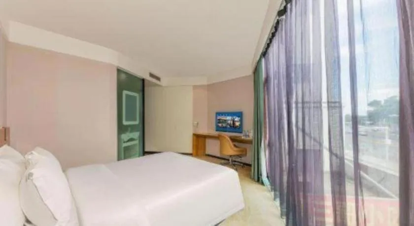 Bed in GreenTree Alliance Hotel Shenzhen Yantian District Dameisha